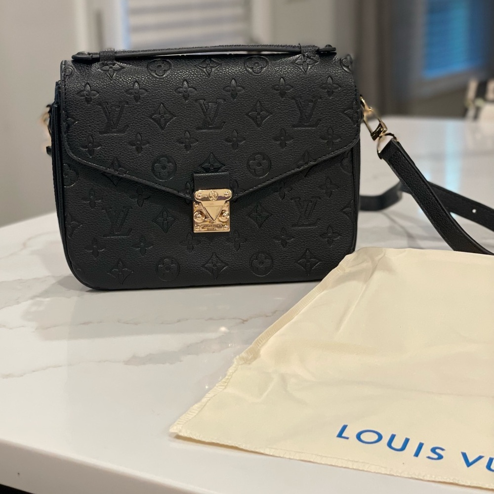Black leather bag.